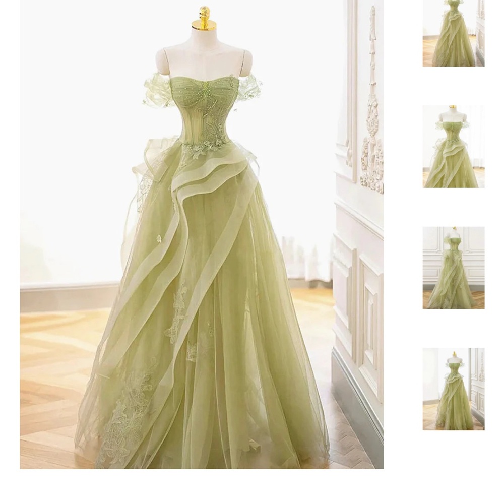 A light green never worn recently bought prom dress.